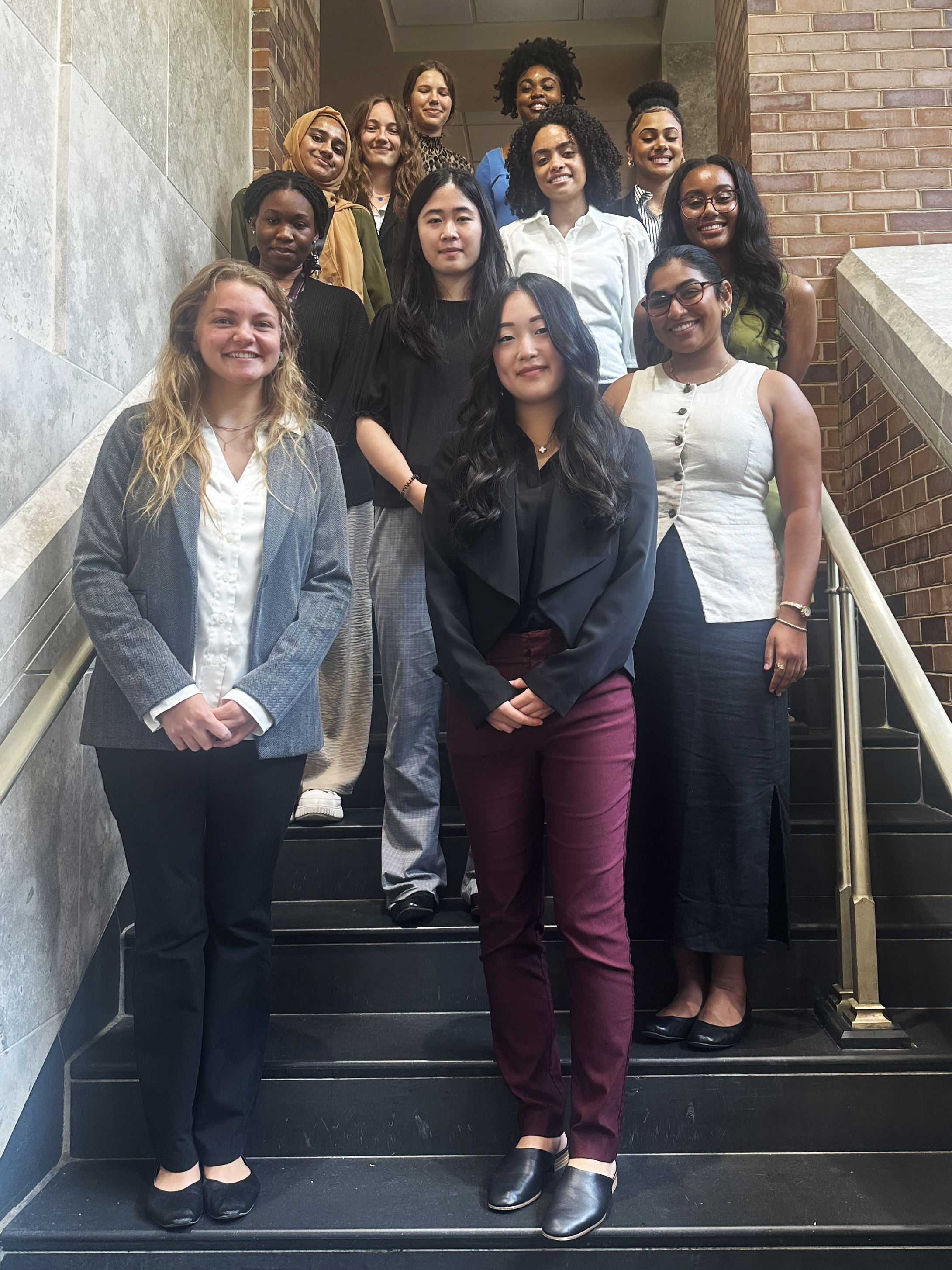 School of Nursing students pictured on a staircase.