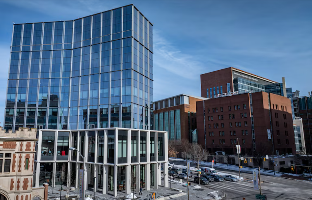 Photo of 4MLK building with other buildings pictured in background. Zoomed in.